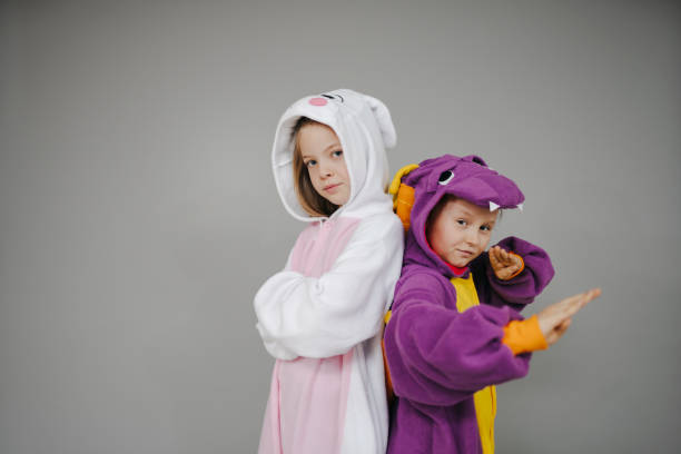 two girls dressed as rabbit and dragon posing