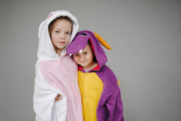 istock two girls dressed as rabbit and dragon posing 1257160111