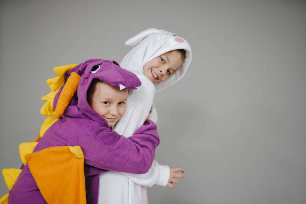 istock two girls dressed as rabbit and dragon posing 1257160231