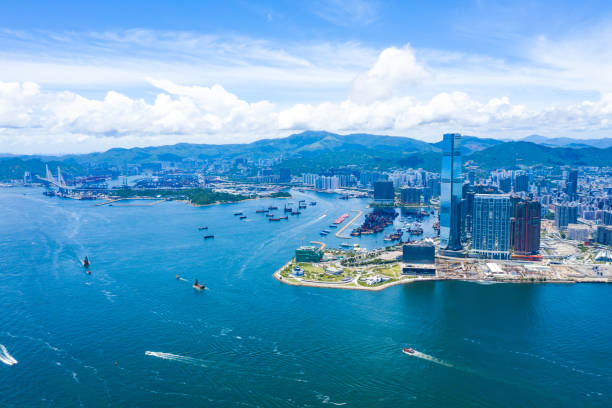 Drone view of West Kowloon from Victoria Peak Drone view of West Kowloon from Victoria Peak kowloon stock pictures, royalty-free photos & images