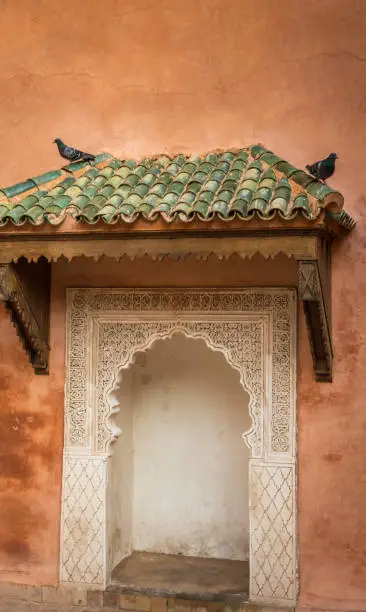 Typical decoration Morocco white door with green roof, arabic style decoration