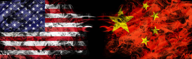 United States and China crisis with flags American and Chinese flags in smoke shape on black background. Concept of conflict war and custom duty. America VS China metaphor. Dollar Yuan exchange currency and international commercial tension. coalition photos stock pictures, royalty-free photos & images