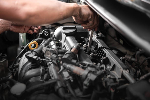 istock Car mechanic working on engine repair 1257168566