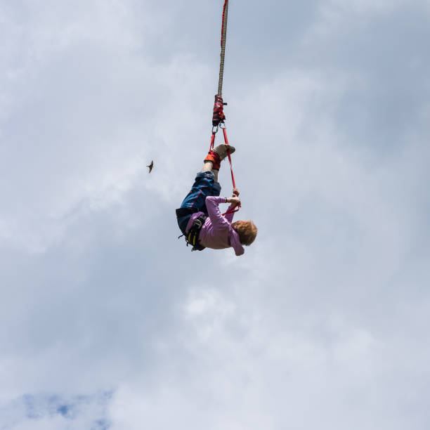 istock Senior lady bungee jump 1257168687