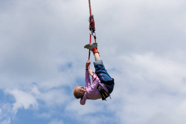 istock Senior lady bungee jump 1257168699