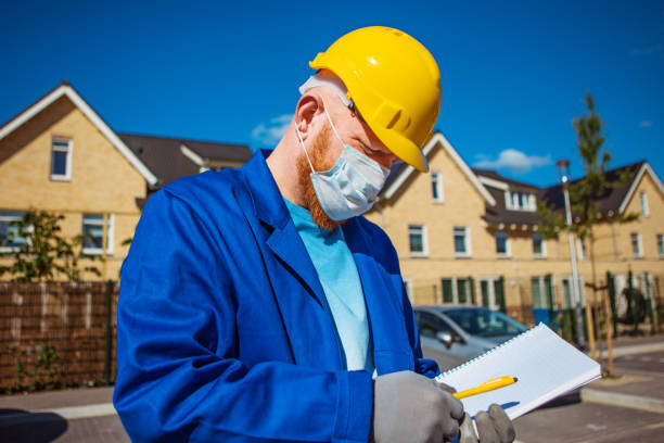 istock A handsome redhead building site foreman wearing a corona mask 1257170161