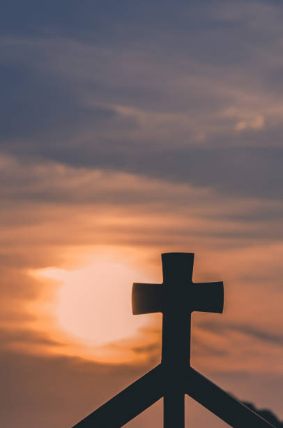 istock christian cross at the sunset 1257175121