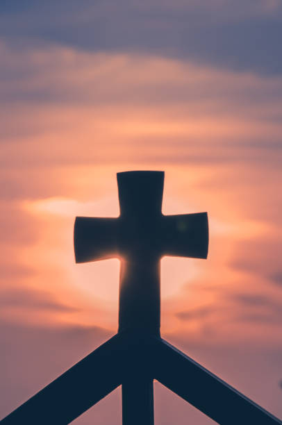 istock christian cross at the sunset 1257175143