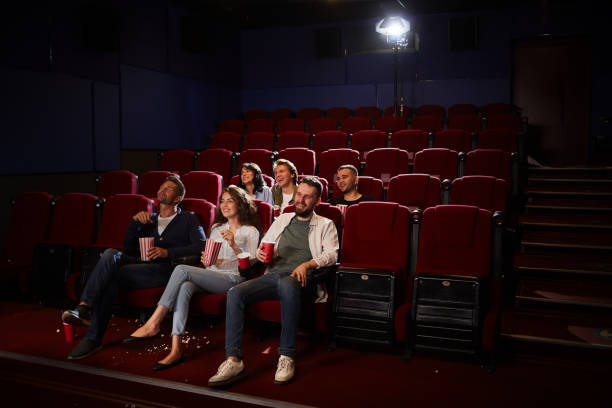 istock Young People Enjoying Private Viewing in Cinema 1257175451