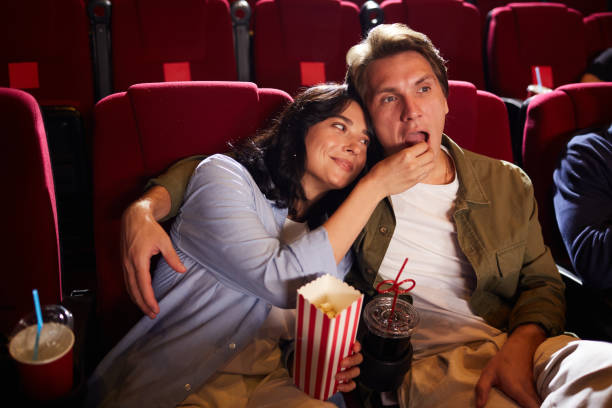 istock Couple Enjoying Date in Cinema 1257175464