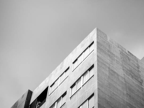 istock The top corner of a modern concrete building. 1257176651