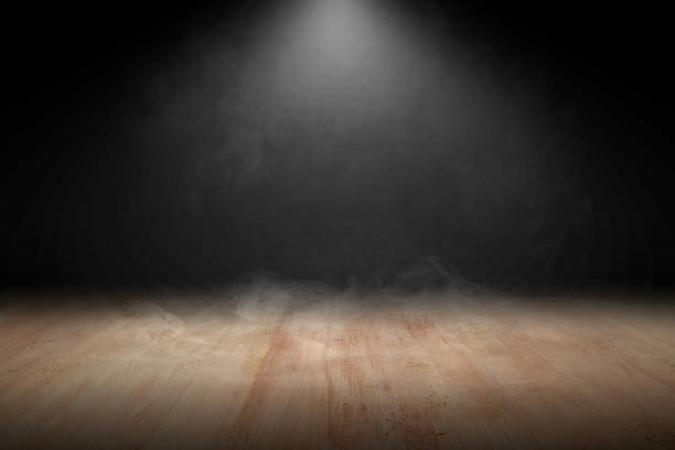 istock Wooden floor with smoke and light 1257178509