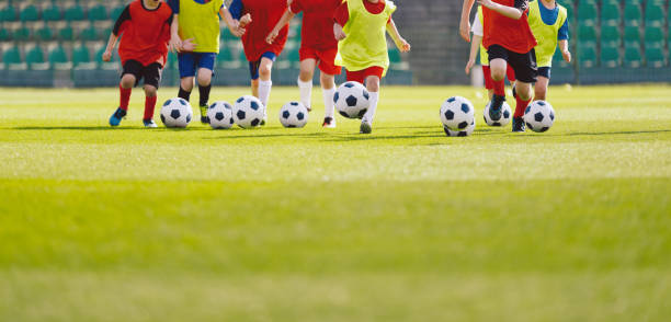 istock Football soccer training for kids 1257178626