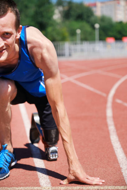 istock Adaptive runner at the start line on track 1257180612