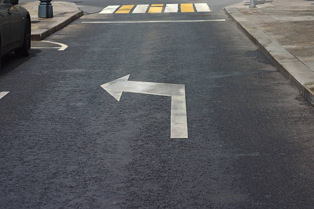 istock the element of road markings on wet pavement 1257182239