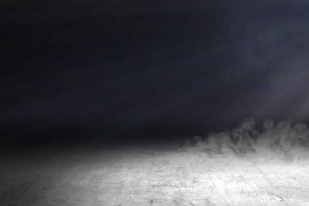 istock Concrete floor with smoke and light 1257182608