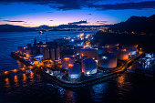 Oil Tank, Power plant in Hong Kong city at dusk