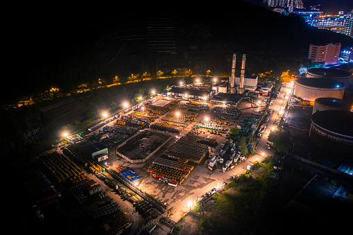 Drone view of Rolls of industrial at night in Hong Kong
