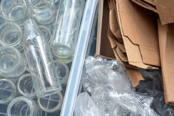istock Plastic bottles, glass and cardboard are sorted for recycling. 1257185780