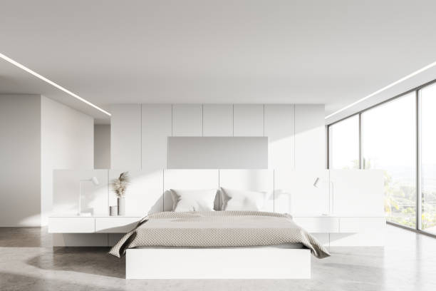 White panoramic master bedroom interior Interior of modern panoramic master bedroom with white walls, concrete floor, comfortable king size bed, panoramic window with blurry tropical view and mirror. 3d rendering owner's bedroom stock pictures, royalty-free photos & images
