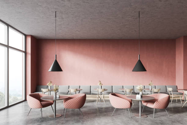 istock Pink coffee shop interior with sofa and armchairs 1257186950