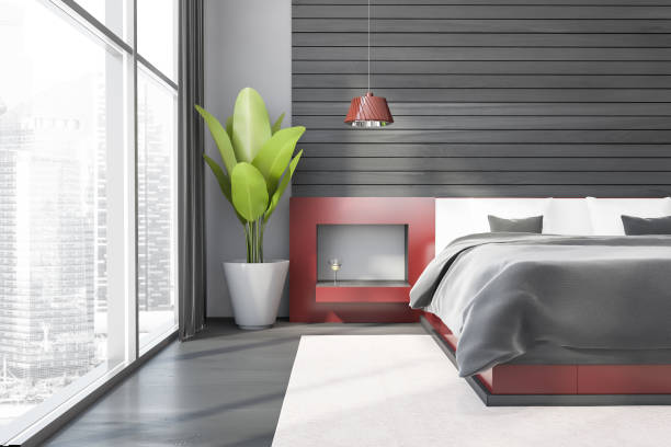 istock Grey and wooden master bedroom with window 1257187165