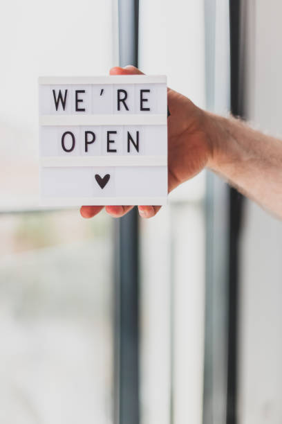 istock End of quarantine. Greeting message We're open 1257190609
