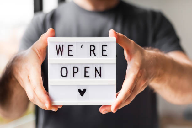 istock End of quarantine. Greeting message We're open 1257191438