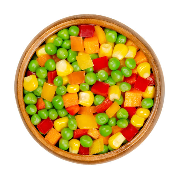 istock Mixed vegetables, veggie mix in a wooden bowl 1257193809