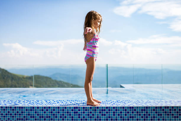 istock Beautiful girl breathing fresh air 1257195575