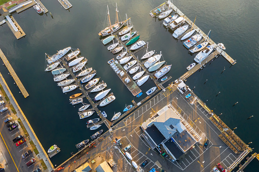 Drone aerial view of Newport Phode Island old tradition building with ocean and yatch port with street summer season