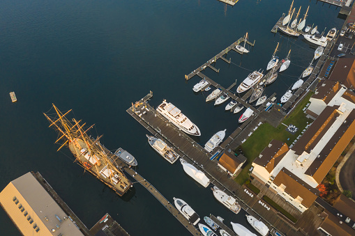 Drone aerial view of Newport Phode Island old tradition building with ocean and yatch port with street summer season