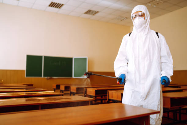 istock Disinfecting school class to prevent COVID-19. 1257197039