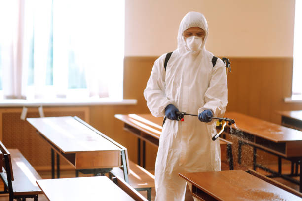 istock Disinfecting school class to prevent COVID-19. 1257197116