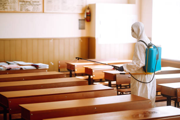 istock Disinfecting school class to prevent COVID-19. 1257197117
