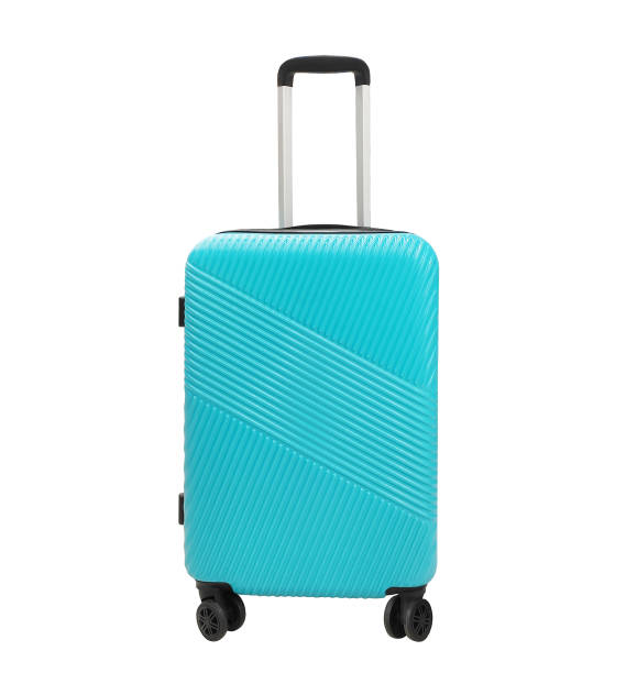 valise turquoise isolée sur un fond blanc - valise à roulettes photos et images de collection