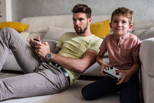 istock Playing video games with my dad 1257199497