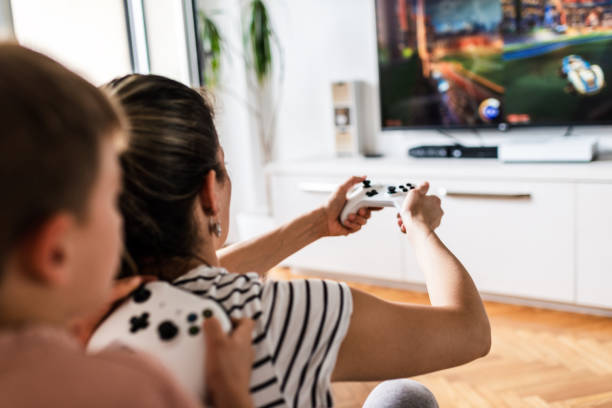 istock Playing video games with my mom 1257199657