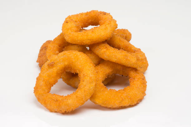 istock Onion rings in  white background 1257209771