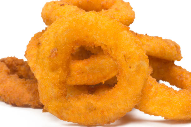istock Onion rings in  white background close 1257210718