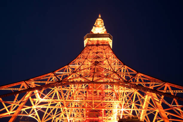 Tower view from below. Minato Ward, Tokyo, Kanto Region, Honshu, Japan, Asia - April 18, 2010: Tokyo Tower view from below. low viewing point stock pictures, royalty-free photos & images