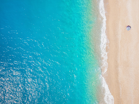 Ideal surfing wave in Atlantic ocean. Glassy turquoise wave