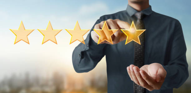 istock Hand of touching rise on increasing five stars. Increase rating evaluation 1257214929