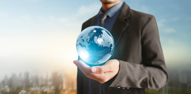 istock Globe ,earth in human hand, holding our planet glowing.  image provided by Nasa 1257214934