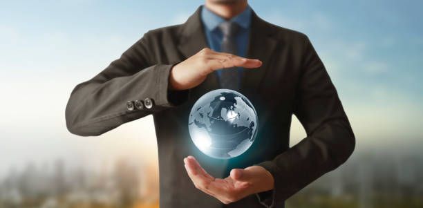 istock Globe ,earth in human hand, holding our planet glowing.  image provided by Nasa 1257214935