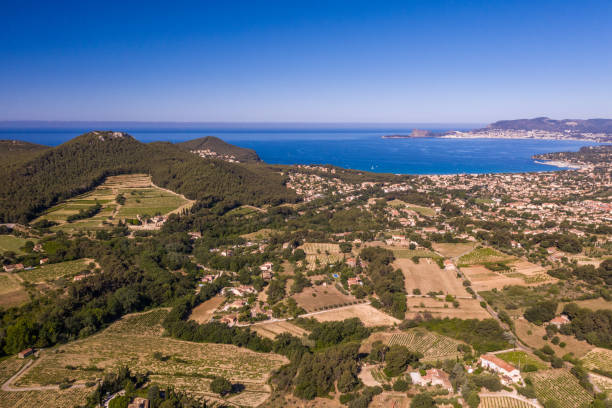 istock Fields and village sky view and sea 1257215797