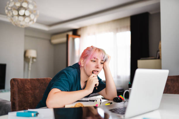 istock Young women studying at home during pandemic isolation 1257216097