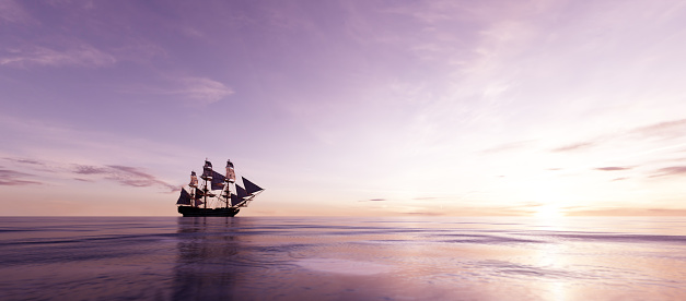 Pirate ship sailing on the ocean at sunset. Retro adventure