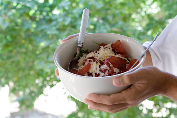 istock Serving Salad with Cheese and Ham 1257218841