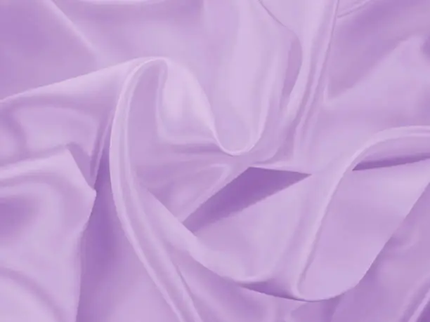 Photo of Beautiful elegant wavy violet purple satin silk luxury cloth fabric texture